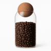Kitchen Storage Jar with Ball Lid filled with coffee beans on a wooden counter.