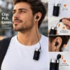 Man using a retractable wired earphone connected to a clip-on device attached to his T-shirt, showing how to clip, pull and wear the earpiece.