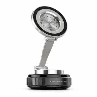 Silver analog quartz clock with a black bezel, adjustable metal arm, and ribbed suction-cup base, shown on a white background.