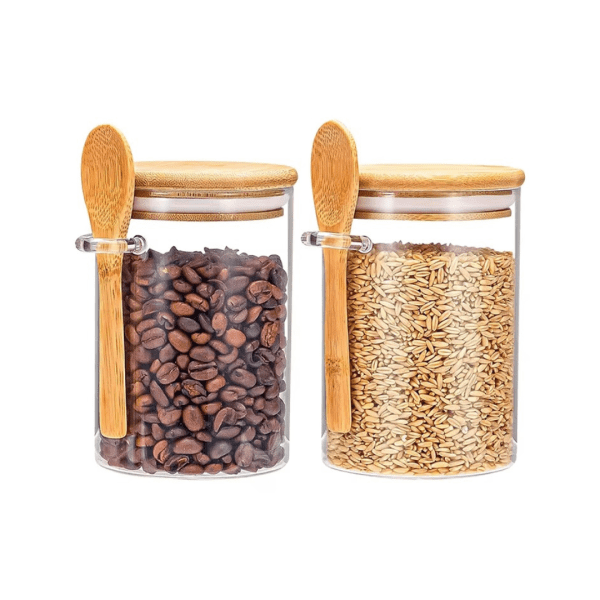 750ml Clear Airtight Glass Jar with bamboo lid and wooden spoon filled with coffee beans.