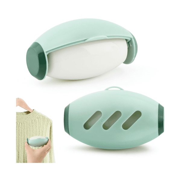 Green Washable Lint Roller being rinsed under water to remove pet hair.