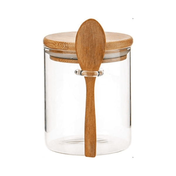 400ml Clear Airtight Glass Jar with bamboo lid and wooden spoon filled with sugar.