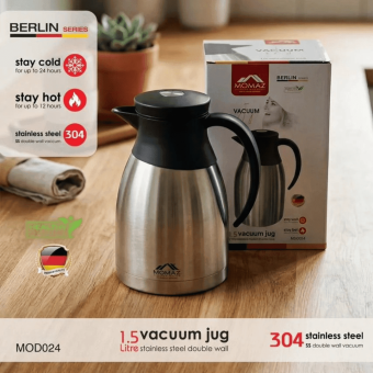 Momaz Berlin Series 1.5L Stainless Steel Vacuum Jug resting on a wooden dining table.
