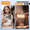 Plokama MS-20 LED photography light panel next to magnetic battery base with hot shoe adapter