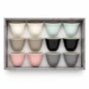 Gift box containing 12 ceramic Arabic coffee cups in assorted pastel, black and grey colors