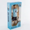 Lionel Messi collectible action figure in the light blue and white striped Argentina national football jersey with number 10, packaged in a branded display window box on a clean white background.