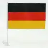 Germany national car flag measuring 30 by 45 cm displaying black, red, and gold stripes on a white window clip pole, isolated on a white background.