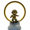 An astronaut table lamp on a moon base with an illuminated golden ring