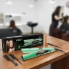 The VGR V-526 hair straightener plates heating up in 30 seconds for smooth styling.