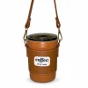 An orange portable coffee tumbler with a leather-style sleeve and shoulder strap.