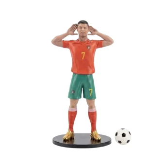 Cristiano Ronaldo collectible action figure in the red and green Portugal national football team jersey with number 7, on a solid white background.