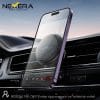 Side angle view of the Nexera NX-CH07 mounted on a car air vent with a phone attached.