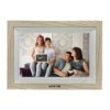 Green Lion digital picture frame displaying family photo, wooden finish