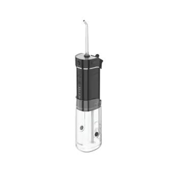 Green Lion portable oral irrigator with water tank, angled view