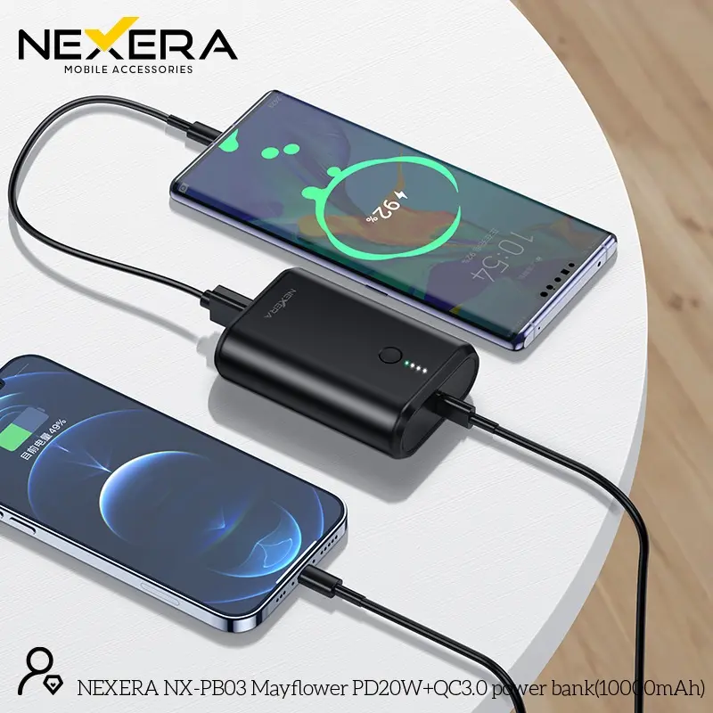 NEXERA Mini Portable Power Bank charging two phones simultaneously