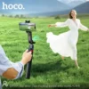 Hoco AI Gimbal Selfie Stick tracking a woman in a field, face tracking demo