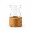 Clear glass yerba mate cup with a natural bamboo base