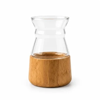 Clear glass yerba mate cup with a natural bamboo base