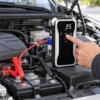 Nexera car jump starter connected to a 12V vehicle battery